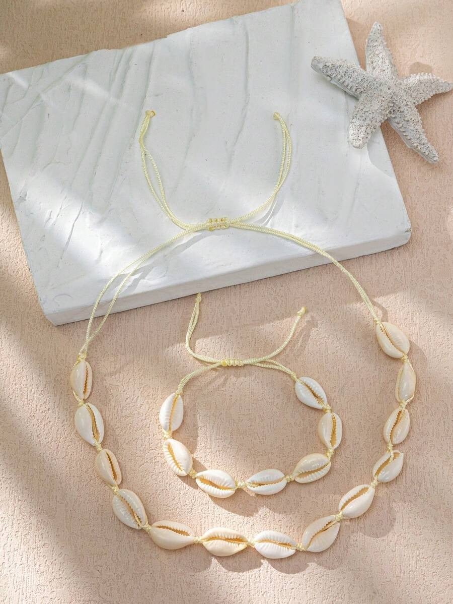 Collar y pulsera con diseño de concha