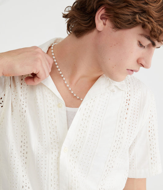 Camisa manga corta con ojal texturizado