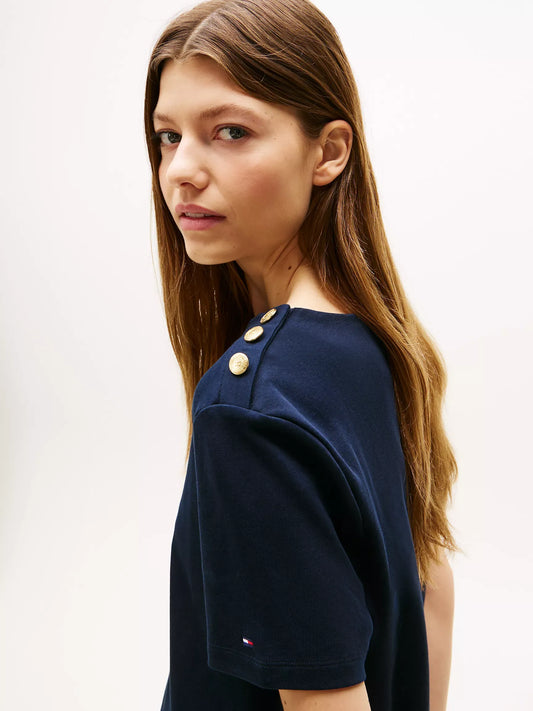 Franela cuello redondo unicolor con botones en los hombros