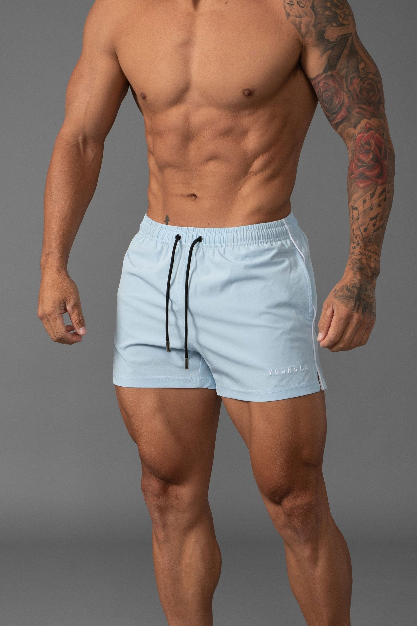Traje de baño con logo bordado 5" secado rápido