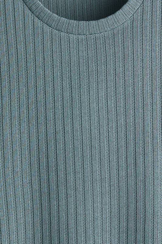 Franela cuello redondo unicolor texturizada