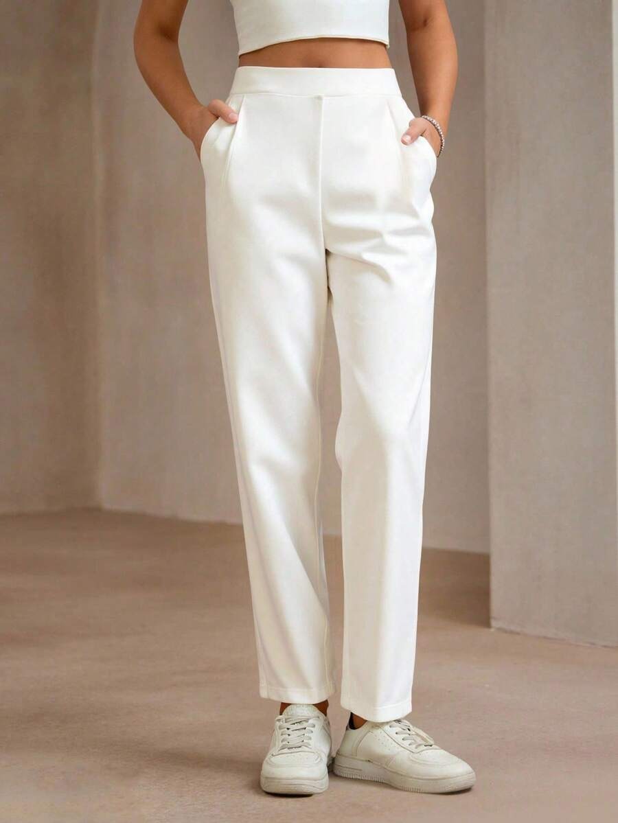 Pantalones rectos elegantes con bolsillos laterales y cremallera PETITE