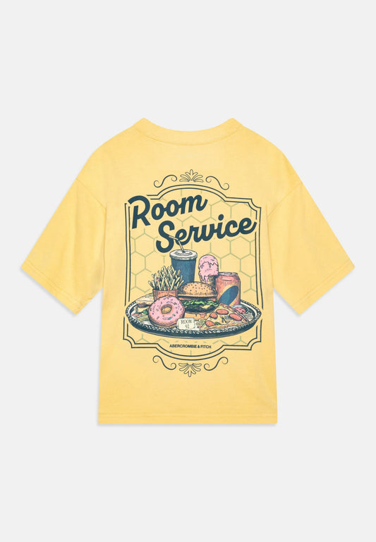 Franela cuello redondo con estampado posterior para niño