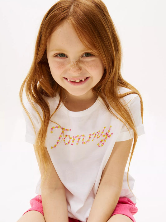 Franela con lentejuelas y nudo bajo para niña