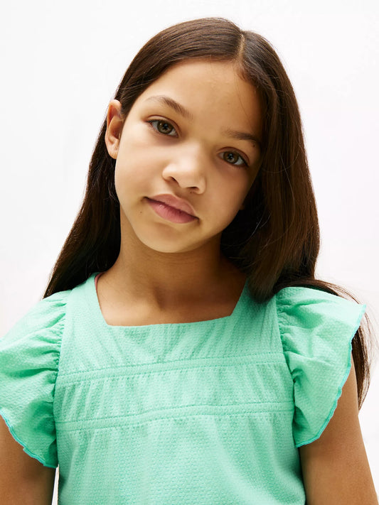 Blusa texturizada con fruncido para niña