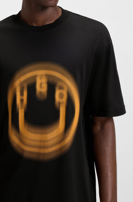 Franela holgada con estampado central de carita