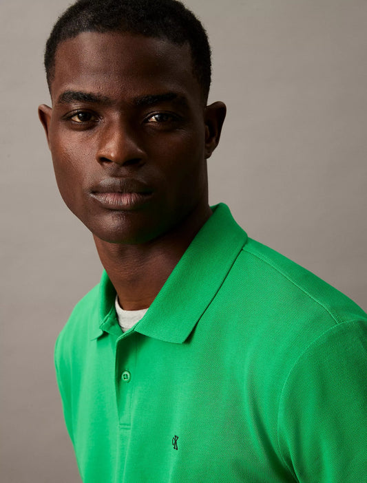 Chemise unicolor con logo