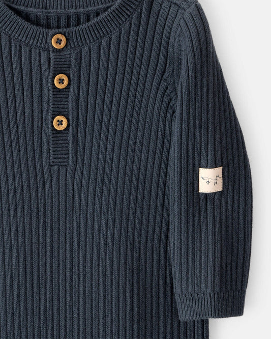 Body tipo braga unicolor con botones para niño