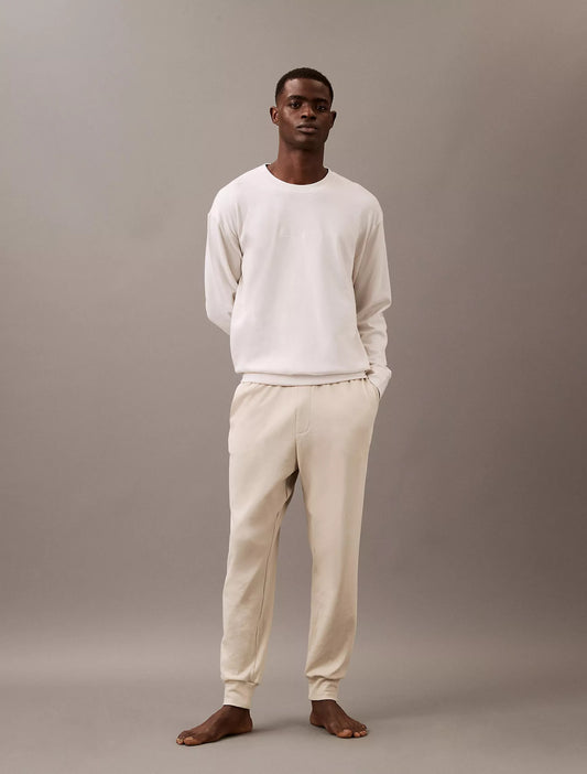 Sudadera cuello redondo unicolor con logo central bordado