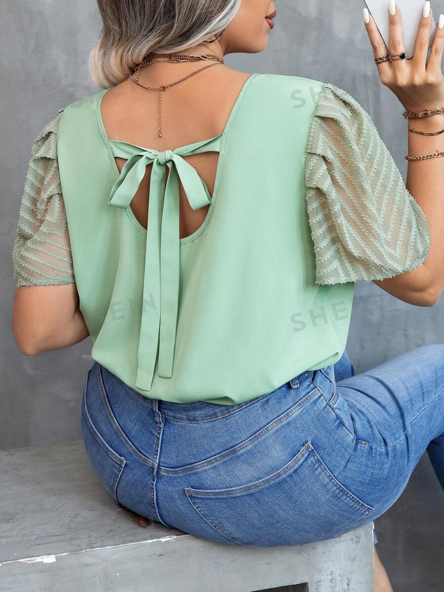 Blusa con tirantes en la espalda