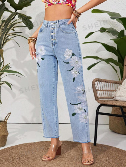 Jeans con estampado floral de cintura alta