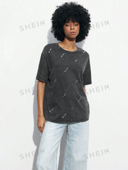 Camiseta oversize con detalles brillantes