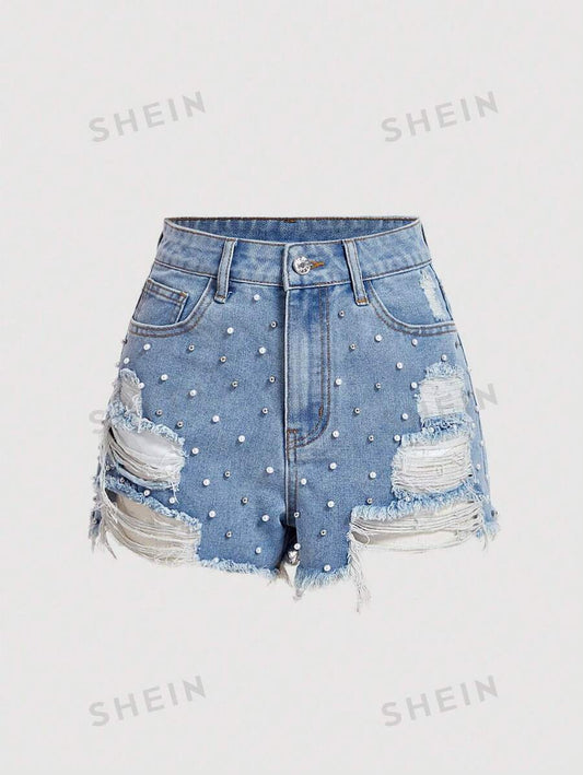 Shorts con bolsillos deshilachados y brillantes