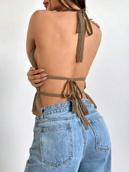 Blusa cuello halter plisada