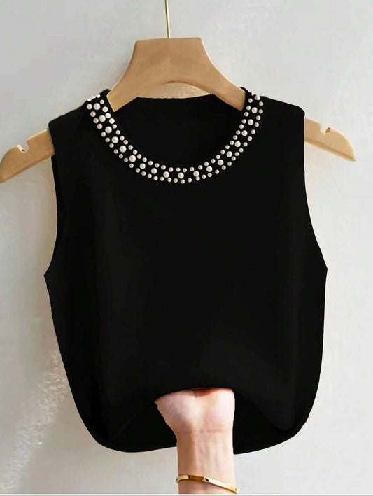 Chaleco sin manga con perlas en el cuello