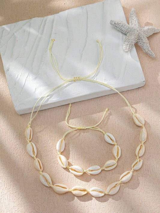 Collar y pulsera con diseño de concha