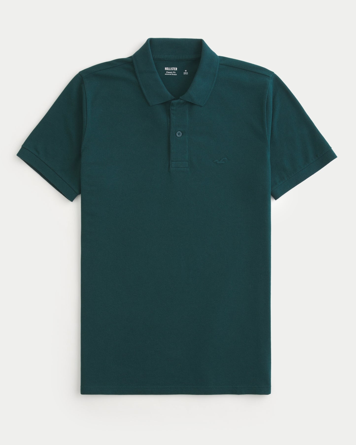 Chemises ajustado unicolor con logo
