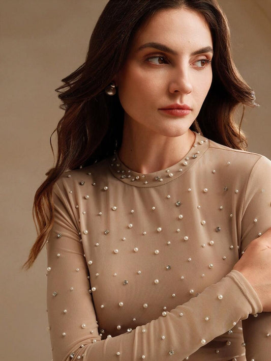 Blusa cuello alto con perlas