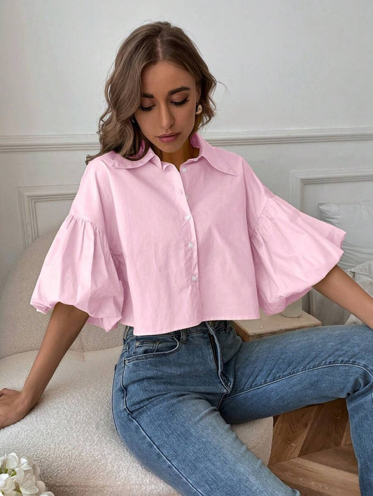 Blusa de manga obispo abotonada