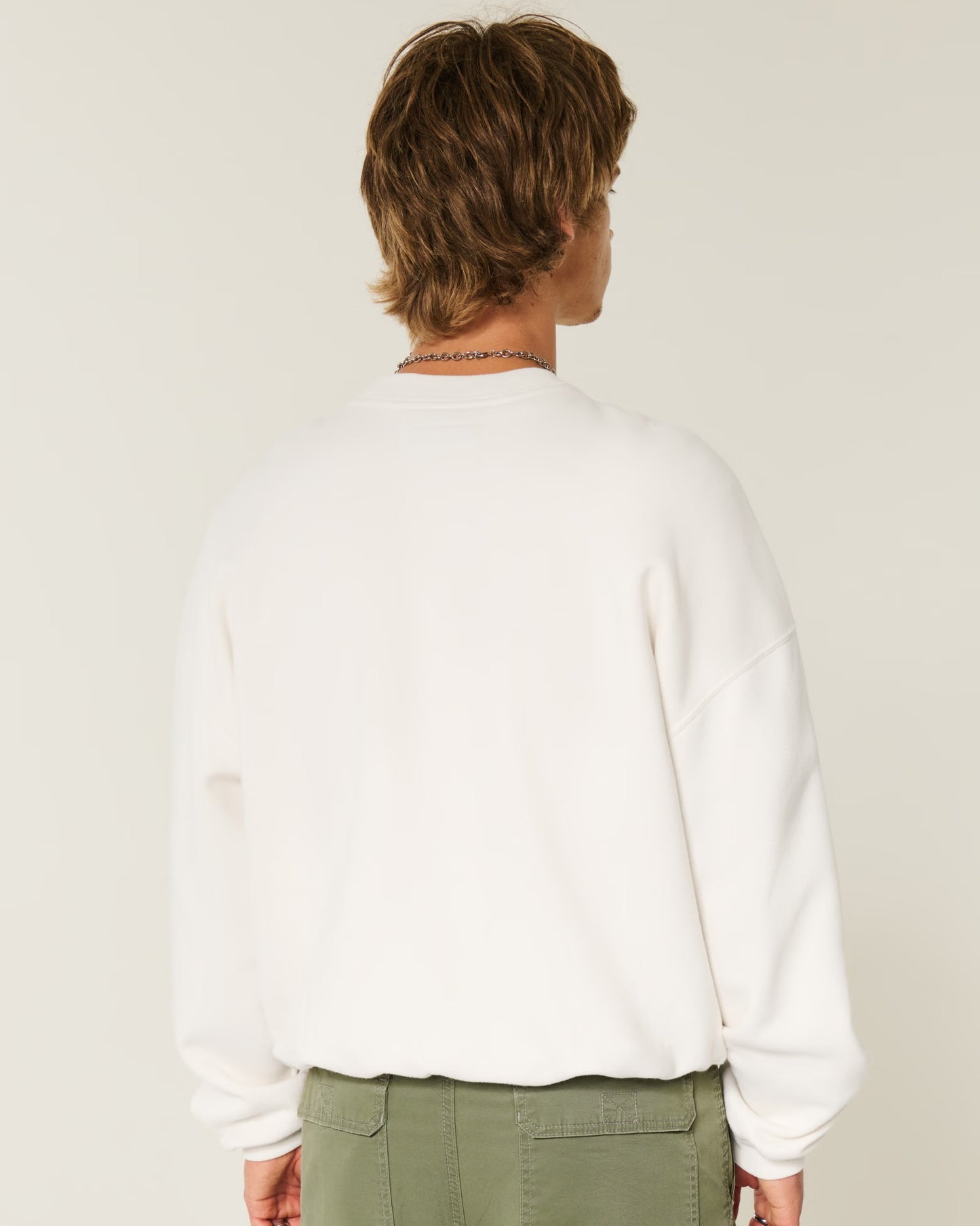 Sudadera holgada con bordado central