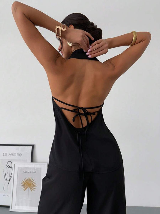 Blusa elegante espalda descubierta y amarrada con lazo