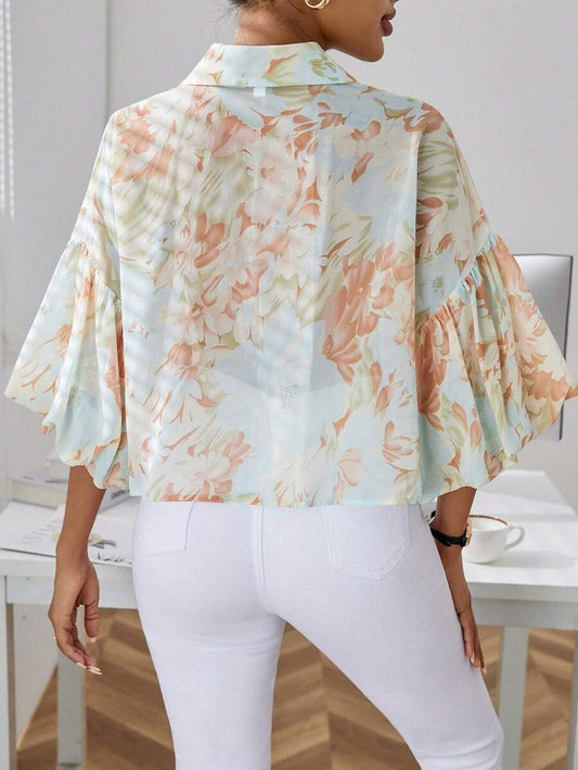 Blusa de manga abullonada con estampado floral