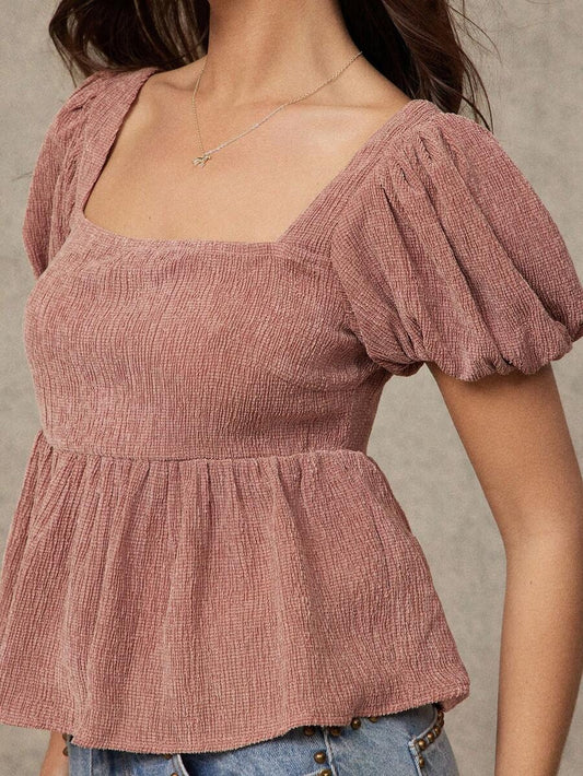 Blusa con volante