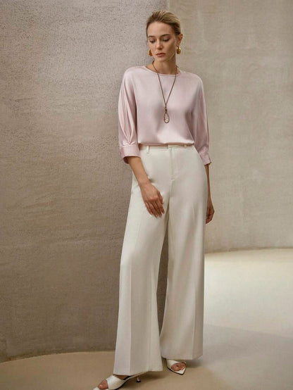 Blusa elegante de textura con orificio en la espalda