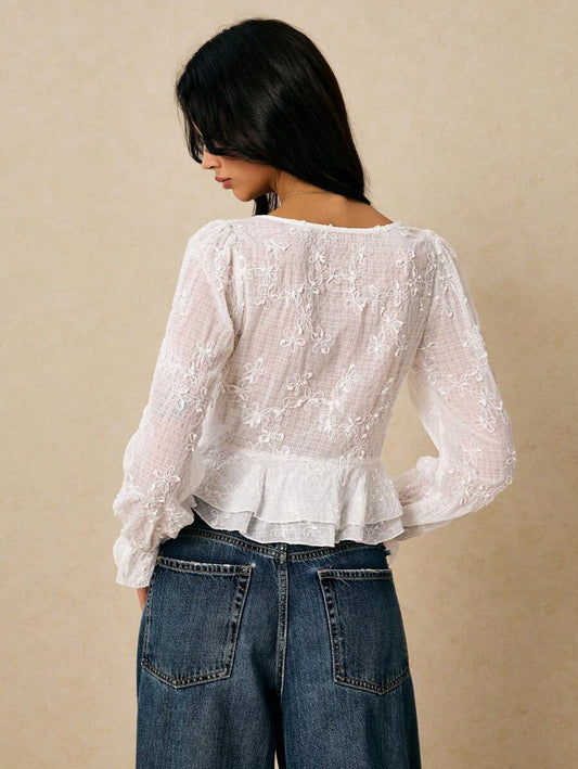 Blusa elegante cuello V y bordado floral