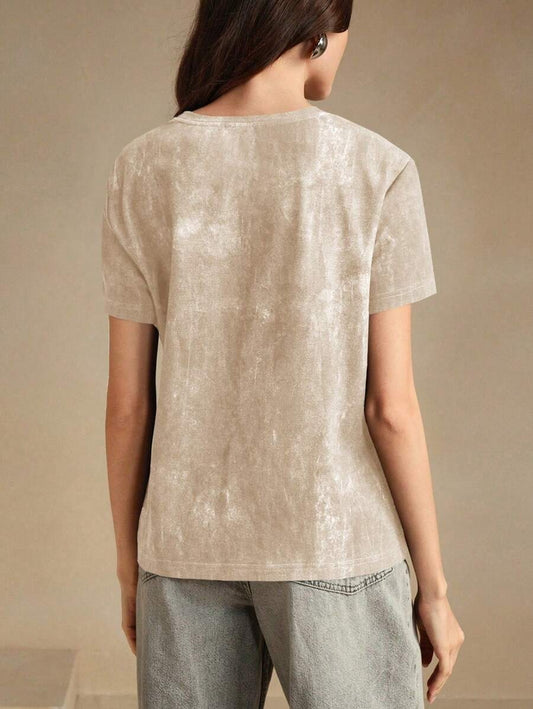 Camiseta con apliques brillantes