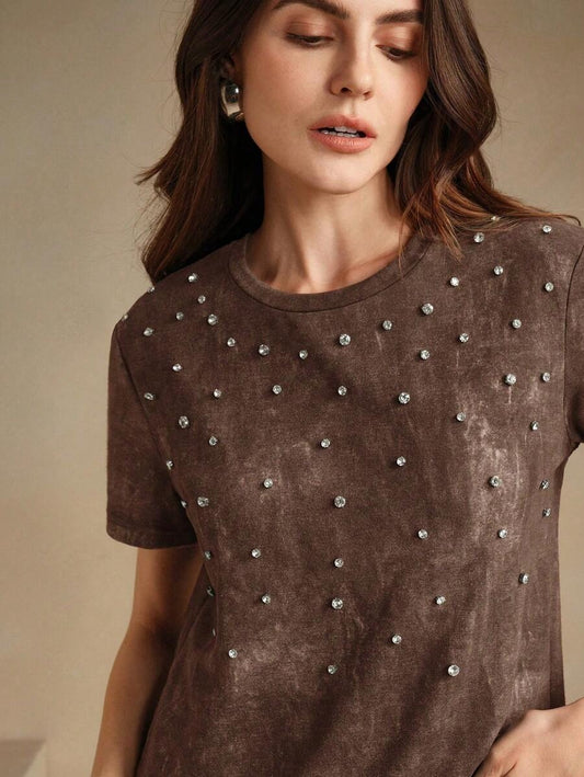 Camiseta con apliques brillantes