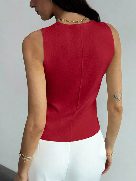 Chaleco de punto con botones dorados