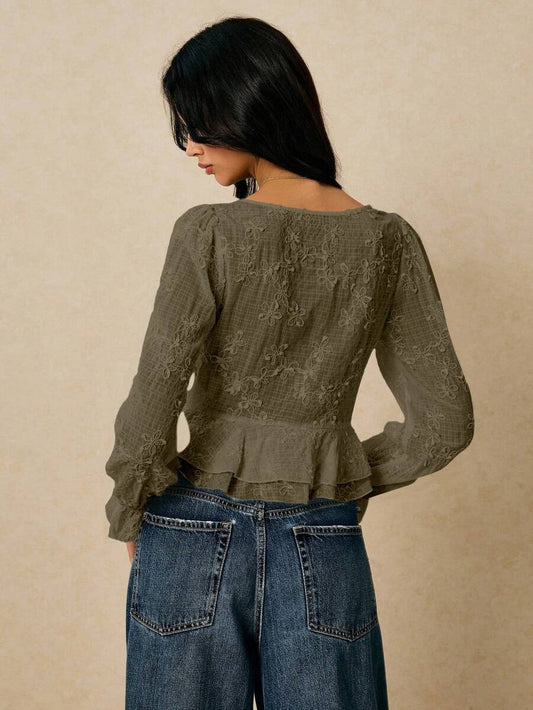 Blusa elegante cuello V y bordado floral