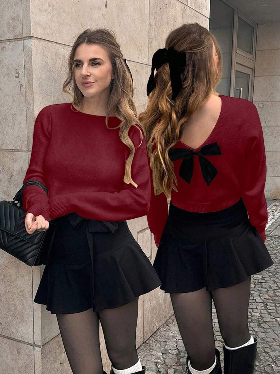 Suéter de punto de cuello redondo y manga larga con diseño de escote en V y lazo