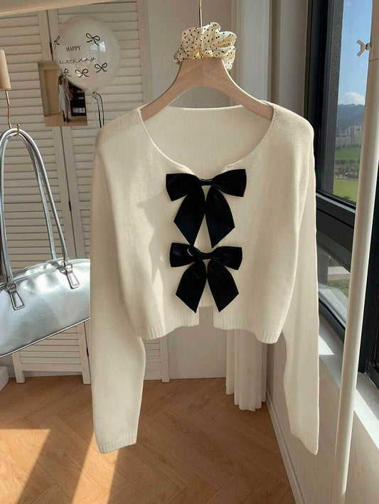 Sueter cuello redondo manga larga con lazos