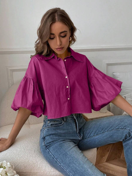 Blusa de manga obispo abotonada