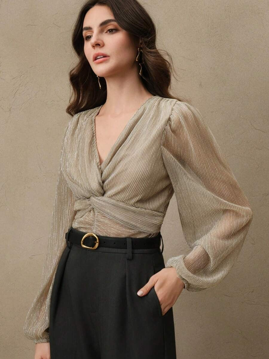 Blusa plisada espalda descubierta y con nudo central