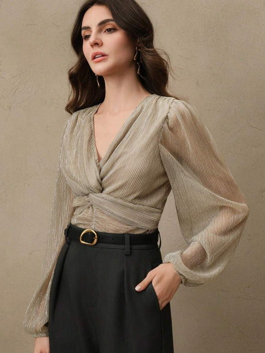 Blusa plisada espalda descubierta y con nudo central