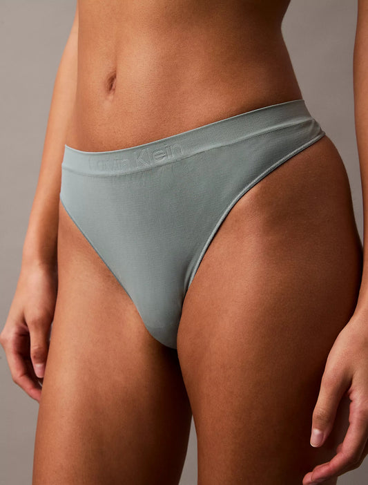 Panty elástica ajustada unicolor con logo tipo hilo
