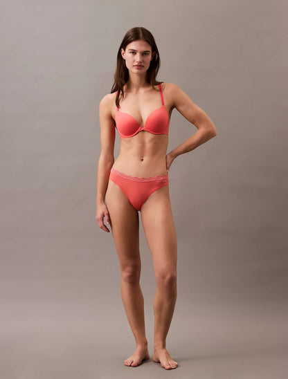 Panty elástica de microfibra unicolor con encaje y logo