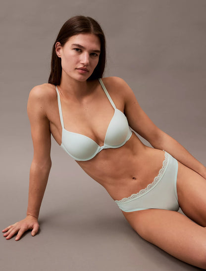 Panty elástica de microfibra unicolor con encaje y logo