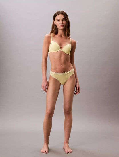 Panty elástica de microfibra unicolor con encaje y logo
