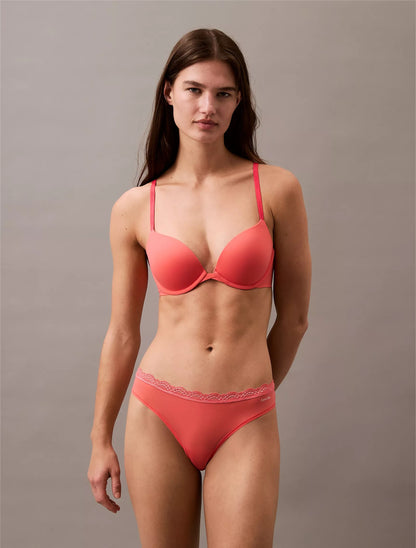 Panty elástica de microfibra unicolor con encaje y logo