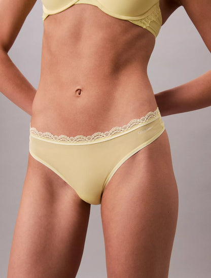 Panty elástica de microfibra unicolor con encaje y logo