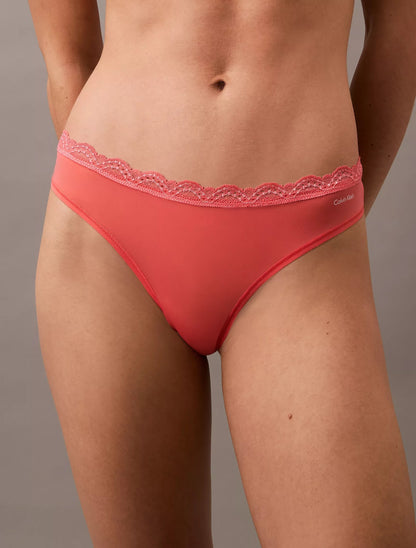 Panty elástica de microfibra unicolor con encaje y logo