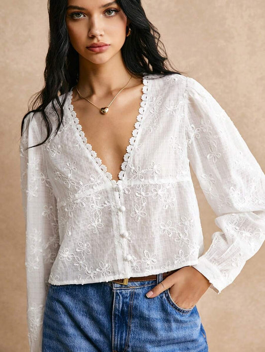Blusa de manga larga con encaje floral