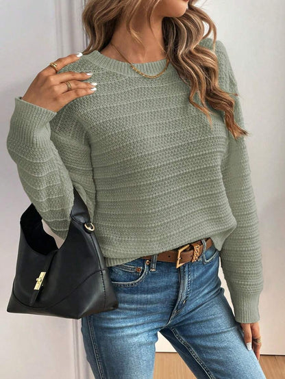 Sueter con lazo decorativo en la parte trasera