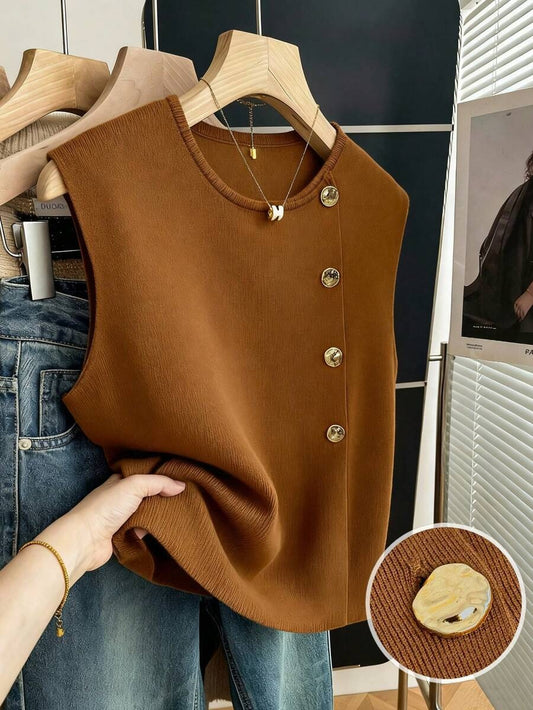 Chaleco de punto y botones metálicos
