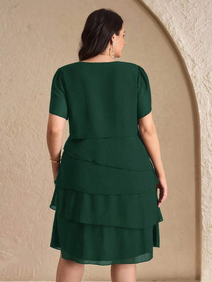 Vestido con cuello redondo y dobladillo con volantes