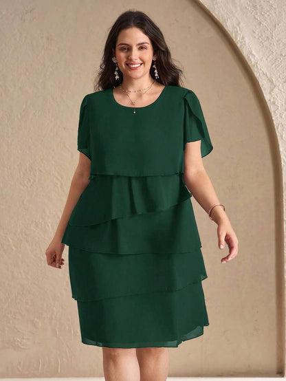 Vestido con cuello redondo y dobladillo con volantes